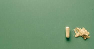 medication pill on green background