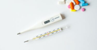 thermometers on white surface