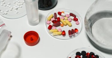 close up shot of medicines on white surface