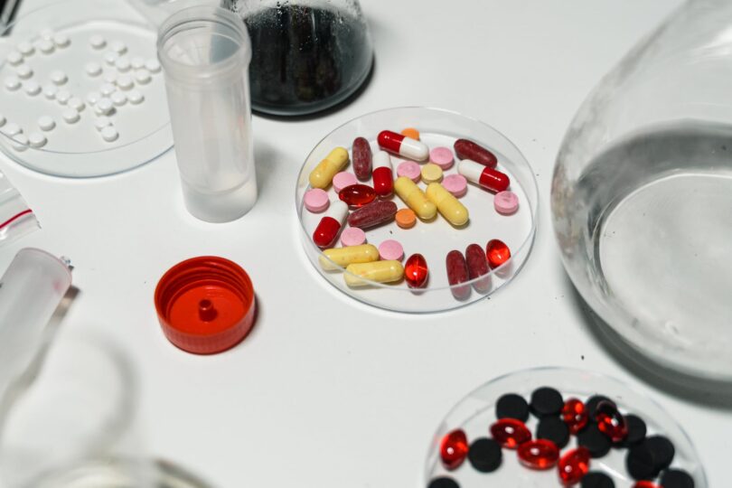 close up shot of medicines on white surface